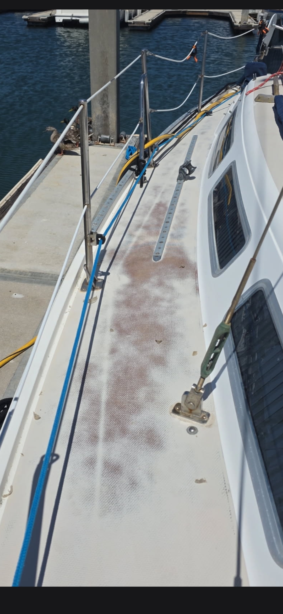 Teak Caprail & Rubrail Brightwork — before